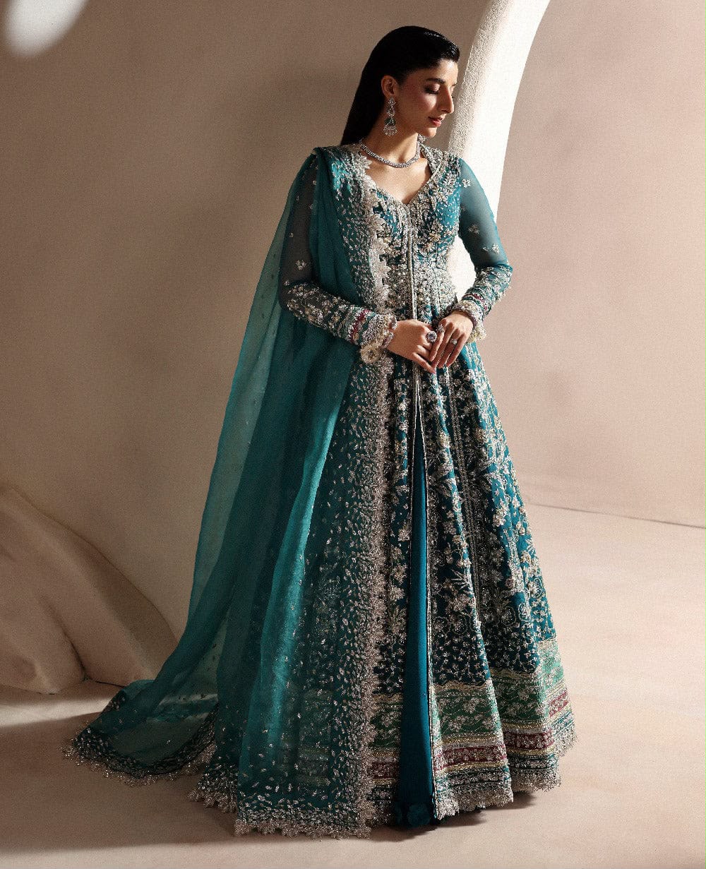 Luxurious red bridal gown with gold embellishments